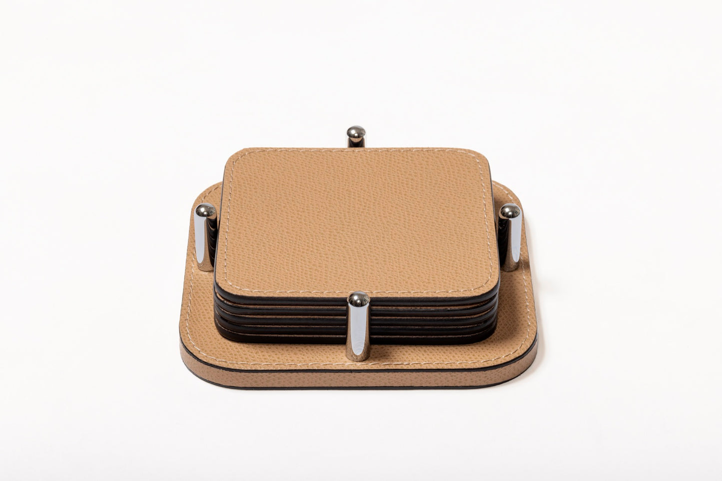 Giobagnara | David Coaster Holder with 6 Tao Coasters: Leather-covered wood coaster holder with configurable shapes and finishes | Serveware + Hospitality / Coasters | 2Jour Concierge, your luxury lifestyle shop | premium table accessories for expensive interiors, dining tables, coffee tables, and refined hospitality spaces