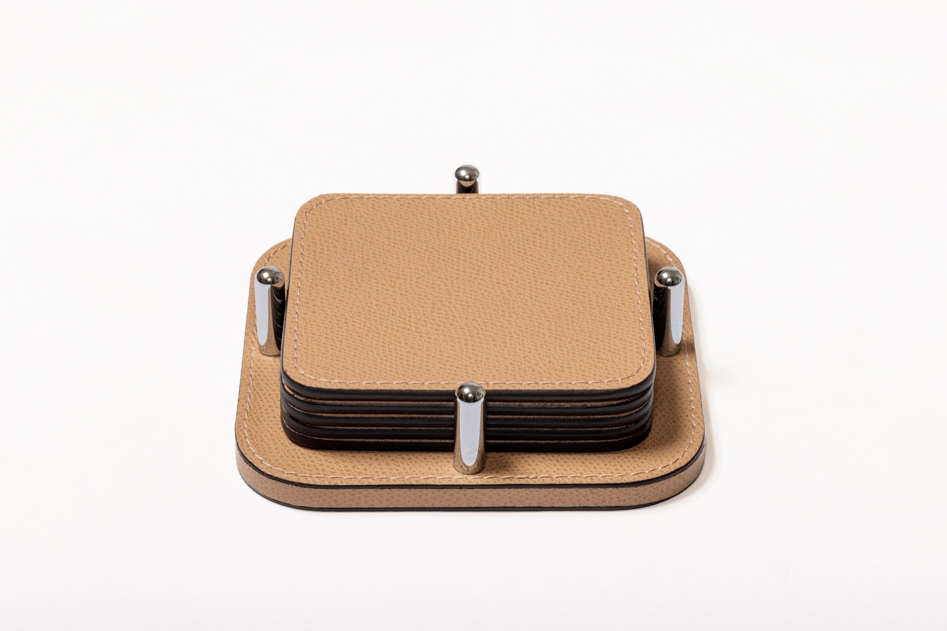 Giobagnara | David Coaster Holder with 6 Tao Coasters: Leather-covered wood coaster holder with configurable shapes and finishes | Serveware + Hospitality / Coasters | 2Jour Concierge, your luxury lifestyle shop | premium table accessories for expensive interiors, dining tables, coffee tables, and refined hospitality spaces