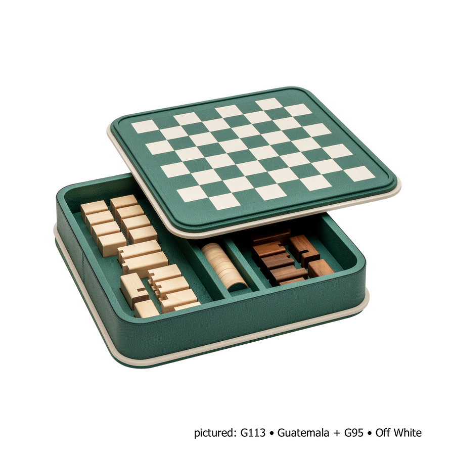 Giobagnara | Rolli Chess and Draughts Set: Leather-covered case with marquetry lid, maple and walnut pieces, leather-inlaid draughts | Game Room | 2Jour Concierge, your luxury lifestyle shop | luxury chess set, Giobagnara Rolli, leather chess board, Italian designer game set, luxury board game