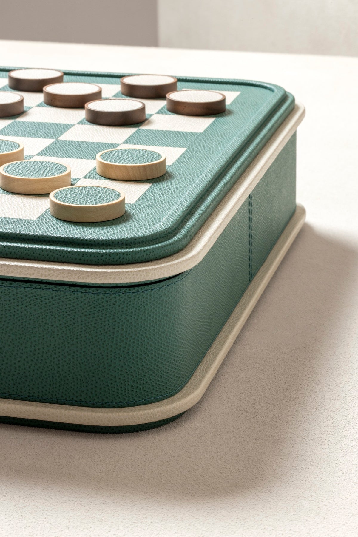 Giobagnara | Rolli Chess and Draughts Set: Leather-covered case with marquetry lid, maple and walnut pieces, leather-inlaid draughts | Game Room | 2Jour Concierge, your luxury lifestyle shop | luxury chess set, Giobagnara Rolli, leather chess board, Italian designer game set, luxury board game