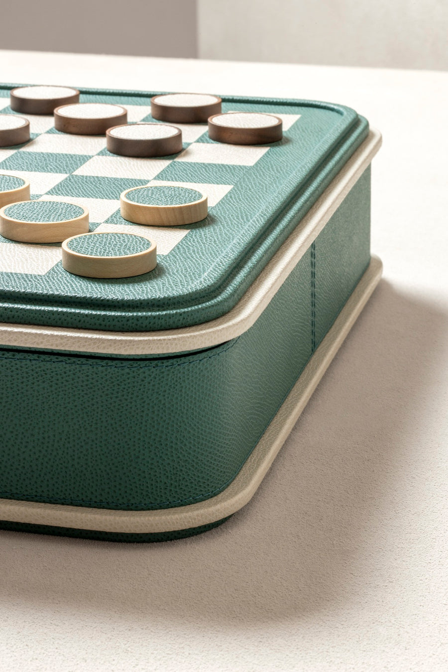 Giobagnara | Rolli Chess and Draughts Set: Leather-covered case with marquetry lid, maple and walnut pieces, leather-inlaid draughts | Game Room | 2Jour Concierge, your luxury lifestyle shop | luxury chess set, Giobagnara Rolli, leather chess board, Italian designer game set, luxury board game