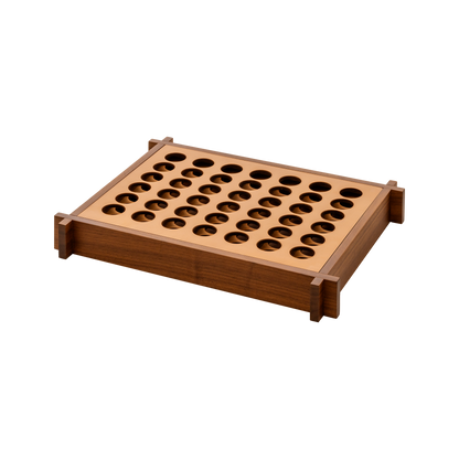 Giobagnara | Structura Connect Four Game Set: Wood structure with sole leather playing field and chips in brown and natural | Game Room | 2Jour Concierge, your luxury lifestyle shop | luxury connect four, Giobagnara Structura, sole leather game set, Italian designer game