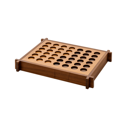 Giobagnara | Structura Connect Four Game Set: Wood structure with sole leather playing field and chips in brown and natural | Game Room | 2Jour Concierge, your luxury lifestyle shop | luxury connect four, Giobagnara Structura, sole leather game set, Italian designer game