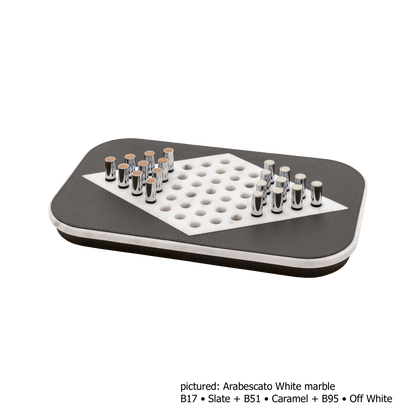 Giobagnara | Delos Chinese Checkers Set Marble: Leather-covered marble board with metal playing pieces with leather inserts — arabescato white or travertino | Game Room | 2Jour Concierge, your luxury lifestyle shop | luxury chinese checkers marble, Giobagnara Delos, marble game set, Italian designer board game