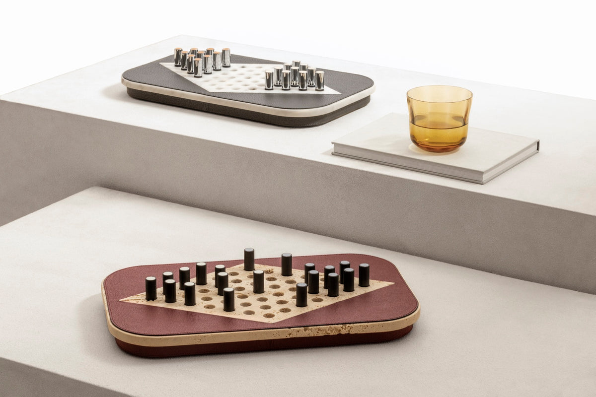 Giobagnara | Delos Chinese Checkers Set Marble: Leather-covered marble board with metal playing pieces with leather inserts — arabescato white or travertino | Game Room | 2Jour Concierge, your luxury lifestyle shop | luxury chinese checkers marble, Giobagnara Delos, marble game set, Italian designer board game