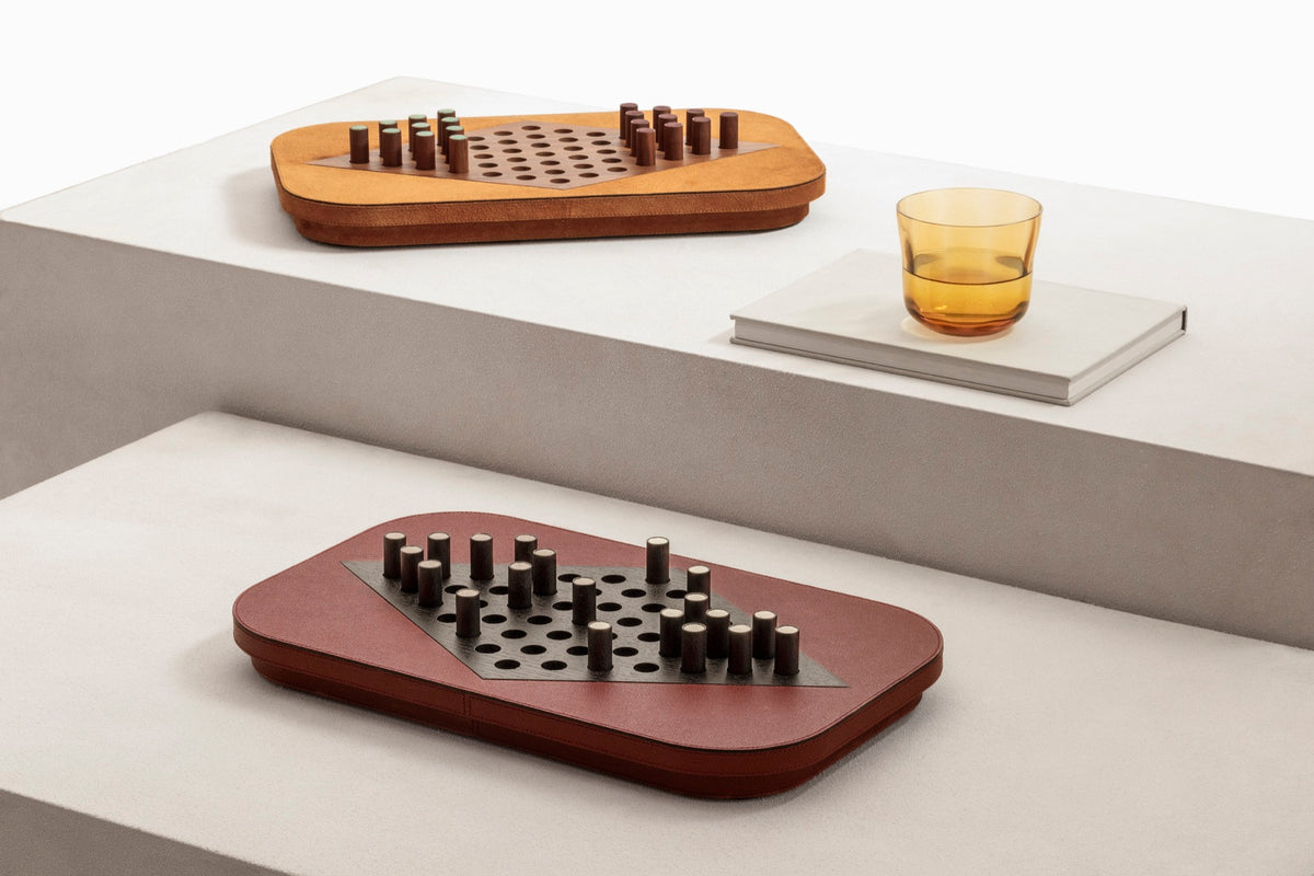 Giobagnara | Delos Chinese Checkers Set: Leather-covered board with playing pieces in wood, marble, or Corian® | Game Room | 2Jour Concierge, your luxury lifestyle shop | luxury chinese checkers, Giobagnara Delos, leather game set, Italian designer board game