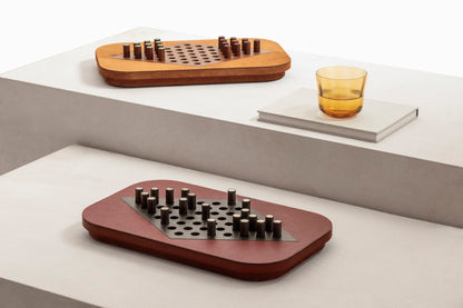 Giobagnara | Delos Chinese Checkers Set: Leather-covered board with playing pieces in wood, marble, or Corian® | Game Room | 2Jour Concierge, your luxury lifestyle shop | luxury chinese checkers, Giobagnara Delos, leather game set, Italian designer board game