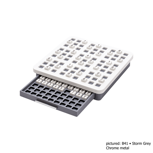Giobagnara | Delos Sudoku Game Set Corian®: Corian® board with 81 Corian® pieces with engraved numbers | Game Room | 2Jour Concierge, your luxury lifestyle shop | luxury sudoku Corian, Giobagnara Delos, Corian sudoku board, Italian designer puzzle