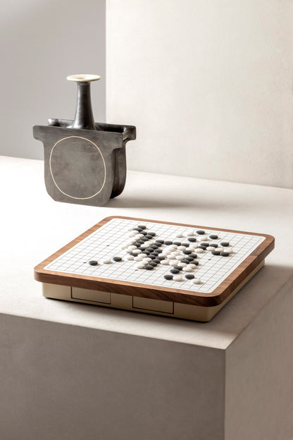 Giobagnara | Delos Go Game Set Wood: Walnut or wengé top with digital-printed leather playing field and Corian® playing beads | Game Room | 2Jour Concierge, your luxury lifestyle shop | luxury go game wood, Giobagnara Delos, walnut game board, Italian designer game set