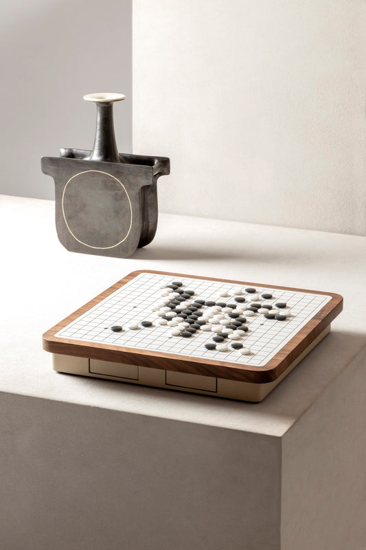 Giobagnara | Delos Go Game Set Wood: Walnut or wengé top with digital-printed leather playing field and Corian® playing beads | Game Room | 2Jour Concierge, your luxury lifestyle shop | luxury go game wood, Giobagnara Delos, walnut game board, Italian designer game set
