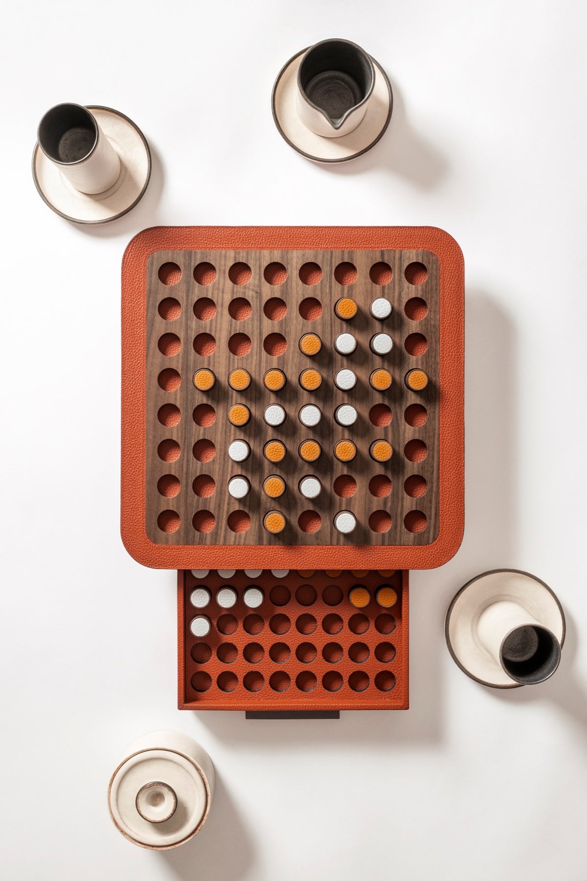 Giobagnara | Delos Othello Game Set Wood: Walnut or wengé leather-covered board with wood playing pieces and leather inserts | Game Room | 2Jour Concierge, your luxury lifestyle shop | luxury othello wood, Giobagnara Delos, walnut game board, Italian designer game