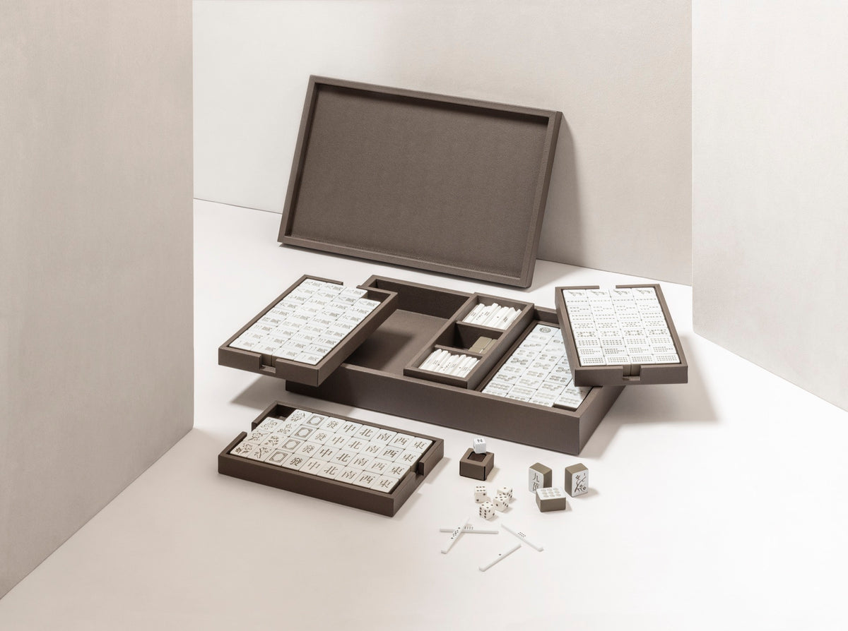 Giobagnara | Mahjong Game Set: Leather-covered wood case with opaque plexiglass tiles, sticks, and dice | Game Room | 2Jour Concierge, your luxury lifestyle shop | luxury mahjong set, Giobagnara mahjong, leather game case, Italian designer game, complete mahjong