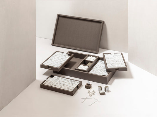 Giobagnara | Mahjong Game Set: Leather-covered wood case with opaque plexiglass tiles, sticks, and dice | Game Room | 2Jour Concierge, your luxury lifestyle shop | luxury mahjong set, Giobagnara mahjong, leather game case, Italian designer game, complete mahjong