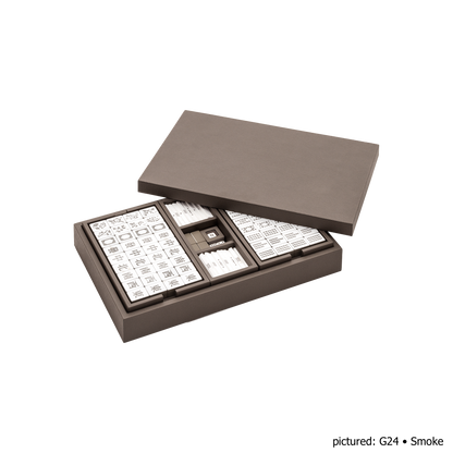 Giobagnara | Mahjong Game Set: Leather-covered wood case with opaque plexiglass tiles, sticks, and dice | Game Room | 2Jour Concierge, your luxury lifestyle shop | luxury mahjong set, Giobagnara mahjong, leather game case, Italian designer game, complete mahjong
