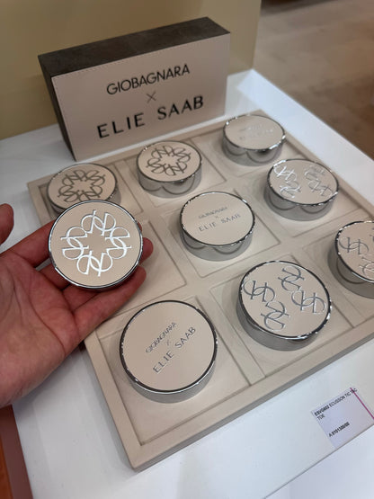 Giobagnara x Elie Saab Ecusson Tic Tac Toe | Leather tray with dividers featuring the Elie Saab Monogram pattern | Includes polished palladium playing pieces with leather inserts and shiny silver debossed decorations | Games and Entertainment | 2Jour Concierge, your luxury lifestyle shop