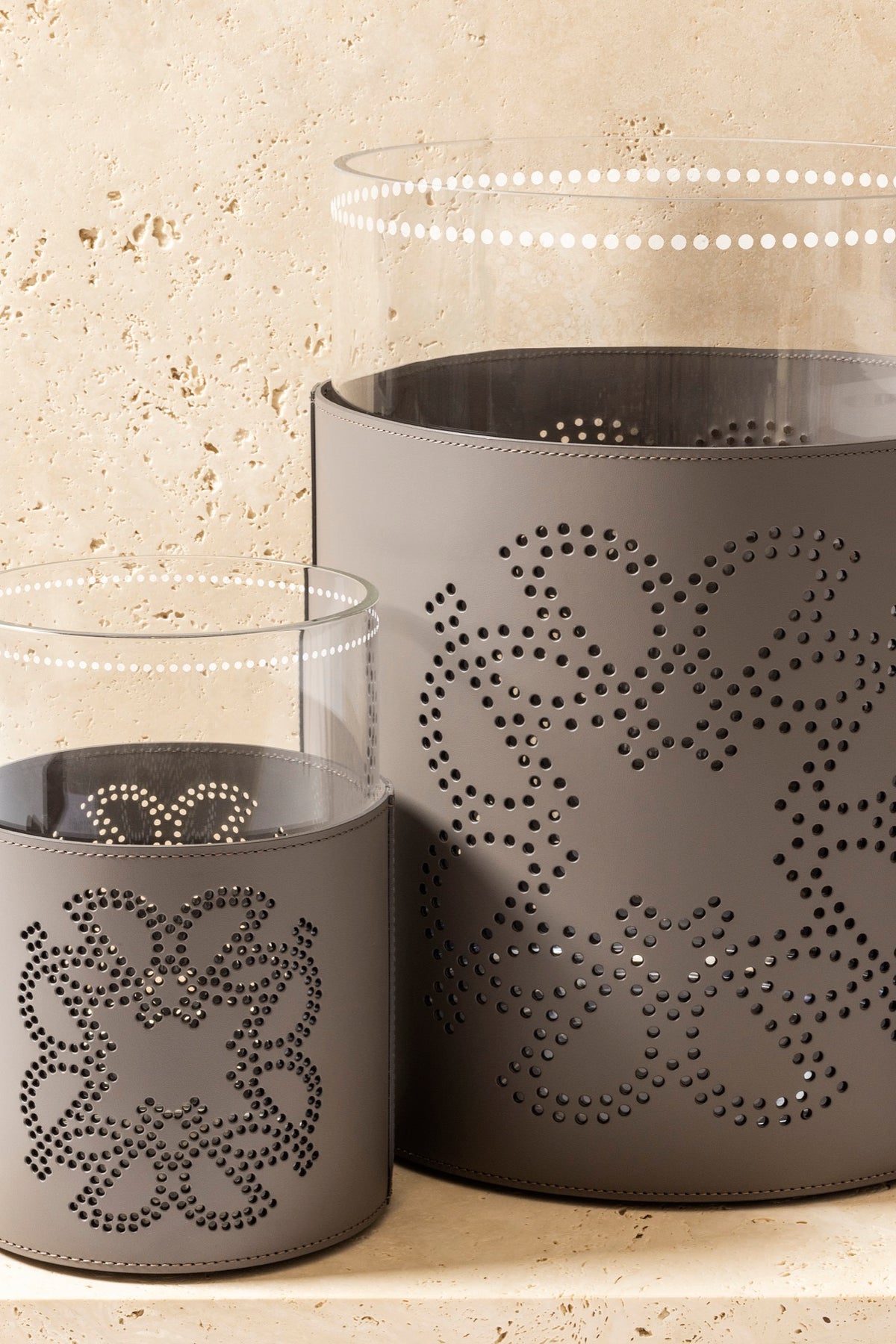 Giobagnara  ×  Elie Saab | Ecusson Hurricane: Borosilicate glass with frosted decorations and Tecnocuoio® with perforated Elie Saab Monogram — small and large | Decor | 2Jour Concierge, your luxury lifestyle shop | luxury hurricane candle holder, Giobagnara Elie Saab, leather hurricane lamp, designer candle lantern