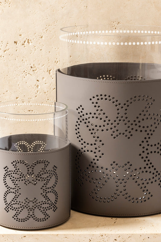 Giobagnara  ×  Elie Saab | Ecusson Hurricane: Borosilicate glass with frosted decorations and Tecnocuoio® with perforated Elie Saab Monogram — small and large | Decor | 2Jour Concierge, your luxury lifestyle shop | luxury hurricane candle holder, Giobagnara Elie Saab, leather hurricane lamp, designer candle lantern