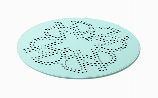 Giobagnara × Elie Saab Ecusson | Placemat: Reinforced Tecnocuoio® leather with perforated monogram motif, water- and UV-resistant | Serveware + Hospitality / Placemats & Underplates | 2Jour Concierge, your luxury lifestyle shop | designer tableware, luxury dining, hospitality décor, refined entertaining, boutique hotels, yacht décor, elegant interiors