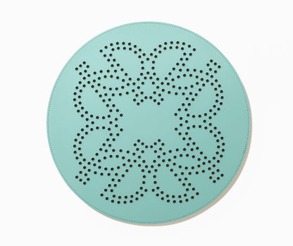 Giobagnara × Elie Saab Ecusson | Placemat: Reinforced Tecnocuoio® leather with perforated monogram motif, water- and UV-resistant | Serveware + Hospitality / Placemats & Underplates | 2Jour Concierge, your luxury lifestyle shop | designer tableware, luxury dining, hospitality décor, refined entertaining, boutique hotels, yacht décor, elegant interiors