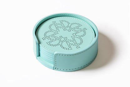 Giobagnara × Elie Saab Ecusson Coaster Holder | Leather coaster holder with matching set of perforated Monogram coasters, water-resistant and UV-protected | Serveware + Hospitality / Coasters | 2Jour Concierge, your luxury lifestyle shop | luxury entertaining, hospitality décor, designer home accessories, boutique hotels, yacht decor, refined lifestyle, table accents