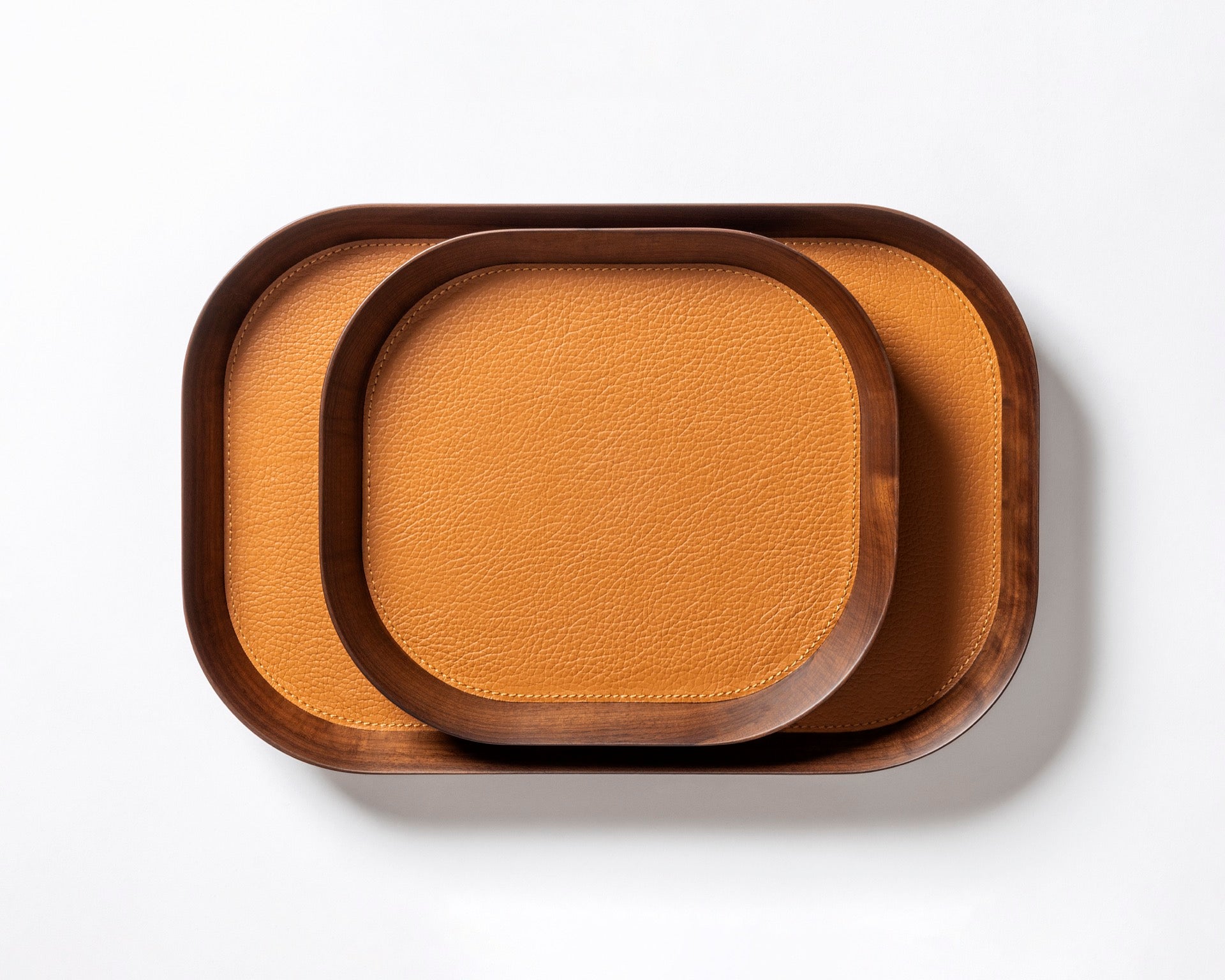 Giobagnara | Valet Tray Pelle Frau®: Walnut wood tray with leather inlay in multiple shapes and sizes | Decor / Valet Trays | 2Jour Concierge, your luxury lifestyle shop | premium leather and wood accessories for refined interiors