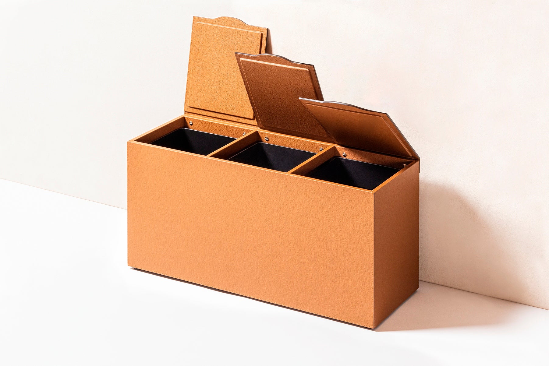 Giobagnara Luna Bins | Leather-covered wood structure with hinged lids | Features removable black opaque plastic containers for easy cleaning and designed for sorting separate waste | Available in double and triple configurations | Home Decor and Storage | 2Jour Concierge, your luxury lifestyle shop