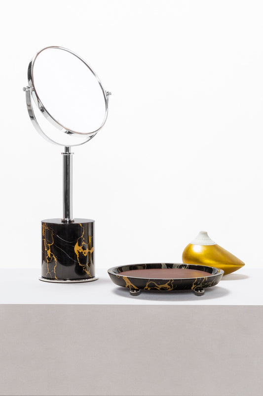 Giobagnara | Positano Marble Freestanding Mirror: Rotating mirror with marble base and metal frame in chrome, bronze, or brass | Jewels + Accessories / Freestanding Mirrors | 2Jour Concierge, your luxury lifestyle shop | refined vanities, dressing rooms, and modern interiors