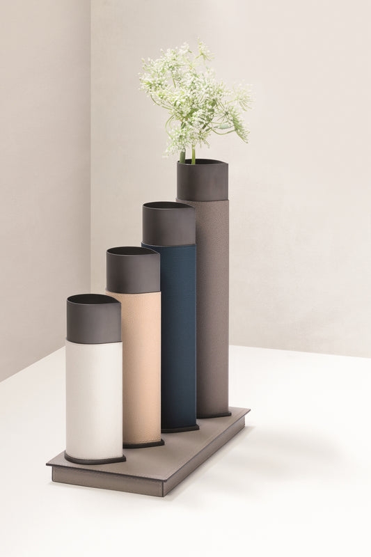 Giobagnara Drop Vase | Partially leather-covered metal vase with a magnetic base for flawless stability on ferrous surfaces or the optional stand (sold separately); offered in three luxurious finishes for versatile display | Home Decor / Vases | 2Jour Concierge, your luxury lifestyle shop
