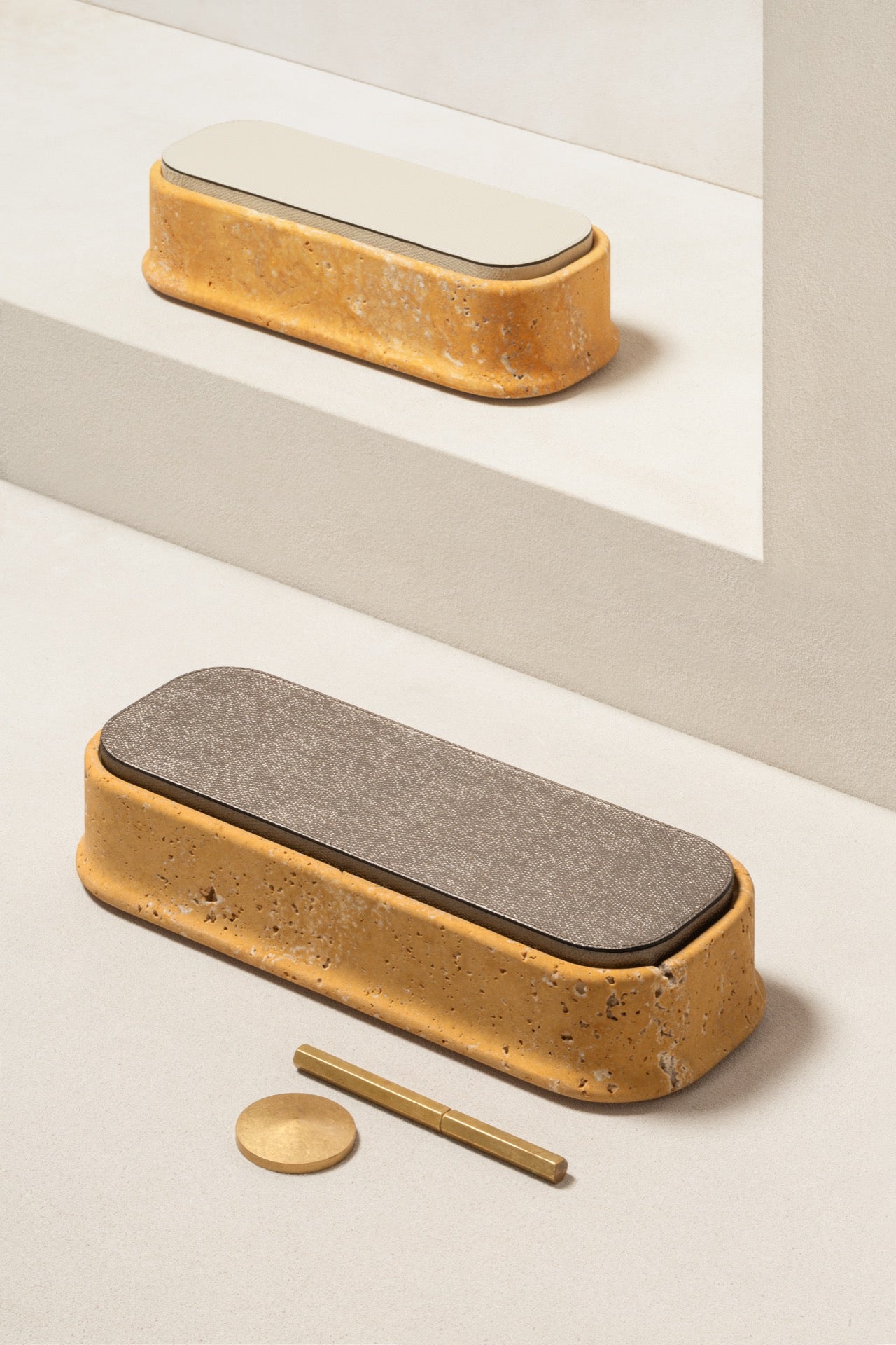 Giobagnara | Rodi Marble Box: Travertine marble with removable leather lid, available in various shapes and sizes | Decor / Trinket Boxes | 2Jour Concierge, your luxury lifestyle shop | Italian marble, natural texture, handcrafted detail, sculptural design