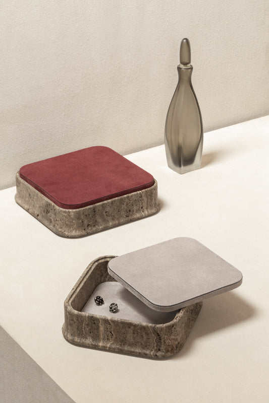 Giobagnara | Rodi Marble Box: Travertine marble with removable leather lid, available in various shapes and sizes | Decor / Trinket Boxes | 2Jour Concierge, your luxury lifestyle shop | Italian marble, natural texture, handcrafted detail, sculptural design