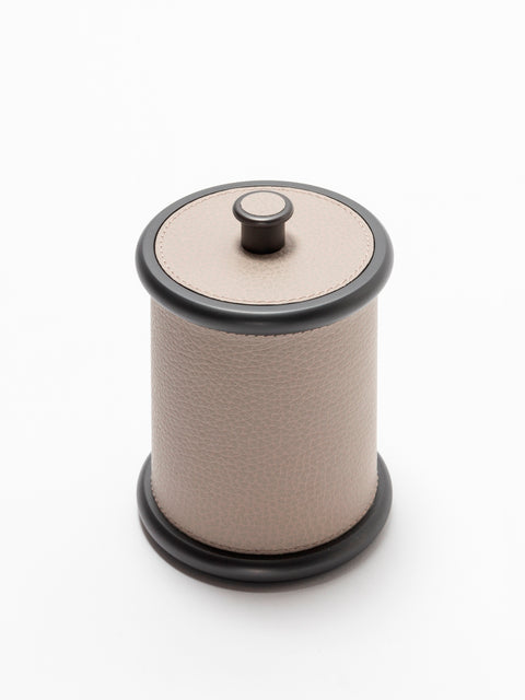Giobagnara Ravello storage boxes | Part of the Ravello bathroom collection | Cylindrical metal boxes with lid, partially covered in fine Italian leather | Available in small and large sizes | Non-slip waterproof rubber base | Finished in chrome, bronze, or brass | Bathroom accessories | 2Jour Concierge, your luxury lifestyle shop