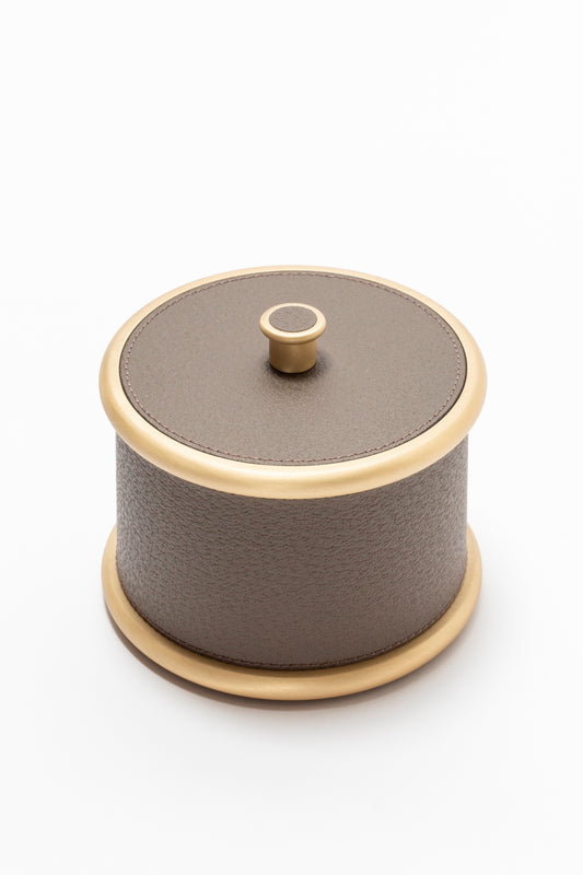 Giobagnara Ravello storage boxes | Part of the Ravello bathroom collection | Cylindrical metal boxes with lid, partially covered in fine Italian leather | Available in small and large sizes | Non-slip waterproof rubber base | Finished in chrome, bronze, or brass | Bathroom accessories | 2Jour Concierge, your luxury lifestyle shop