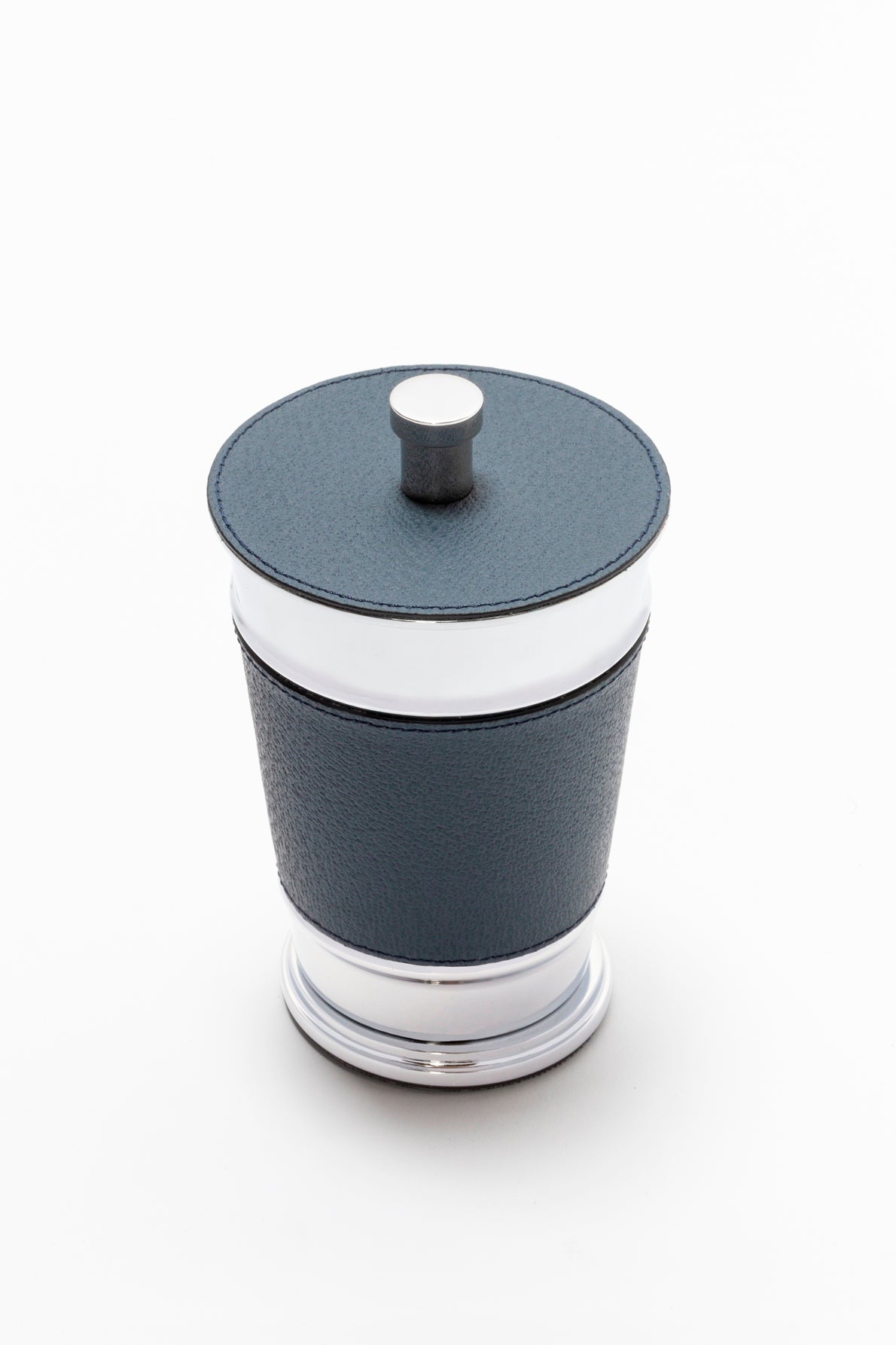 Giobagnara Manhattan trinket box | Elegant storage box with lid from the modern Manhattan collection | Leather-covered metal structure with sculptural contours | Finished with a non-slip waterproof rubber base | Available in chrome, bronze, or brass finishes | Bathroom accessories | 2Jour Concierge, your luxury lifestyle 