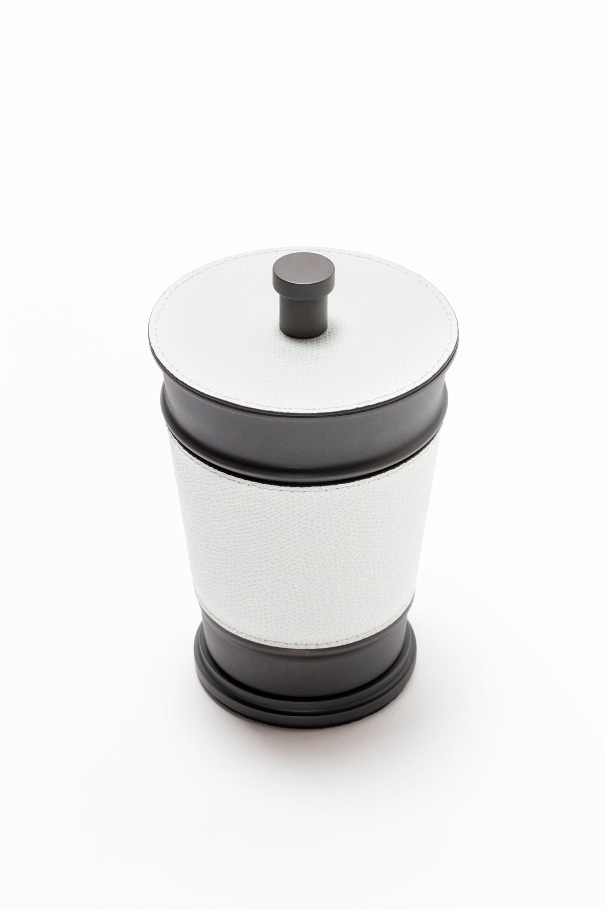 Giobagnara Manhattan trinket box | Elegant storage box with lid from the modern Manhattan collection | Leather-covered metal structure with sculptural contours | Finished with a non-slip waterproof rubber base | Available in chrome, bronze, or brass finishes | Bathroom accessories | 2Jour Concierge, your luxury lifestyle 