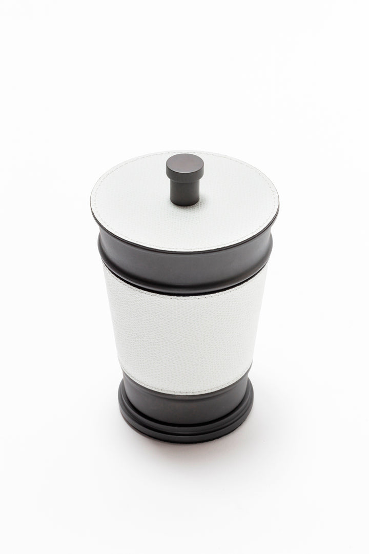 Giobagnara Manhattan trinket box | Elegant storage box with lid from the modern Manhattan collection | Leather-covered metal structure with sculptural contours | Finished with a non-slip waterproof rubber base | Available in chrome, bronze, or brass finishes | Bathroom accessories | 2Jour Concierge, your luxury lifestyle 