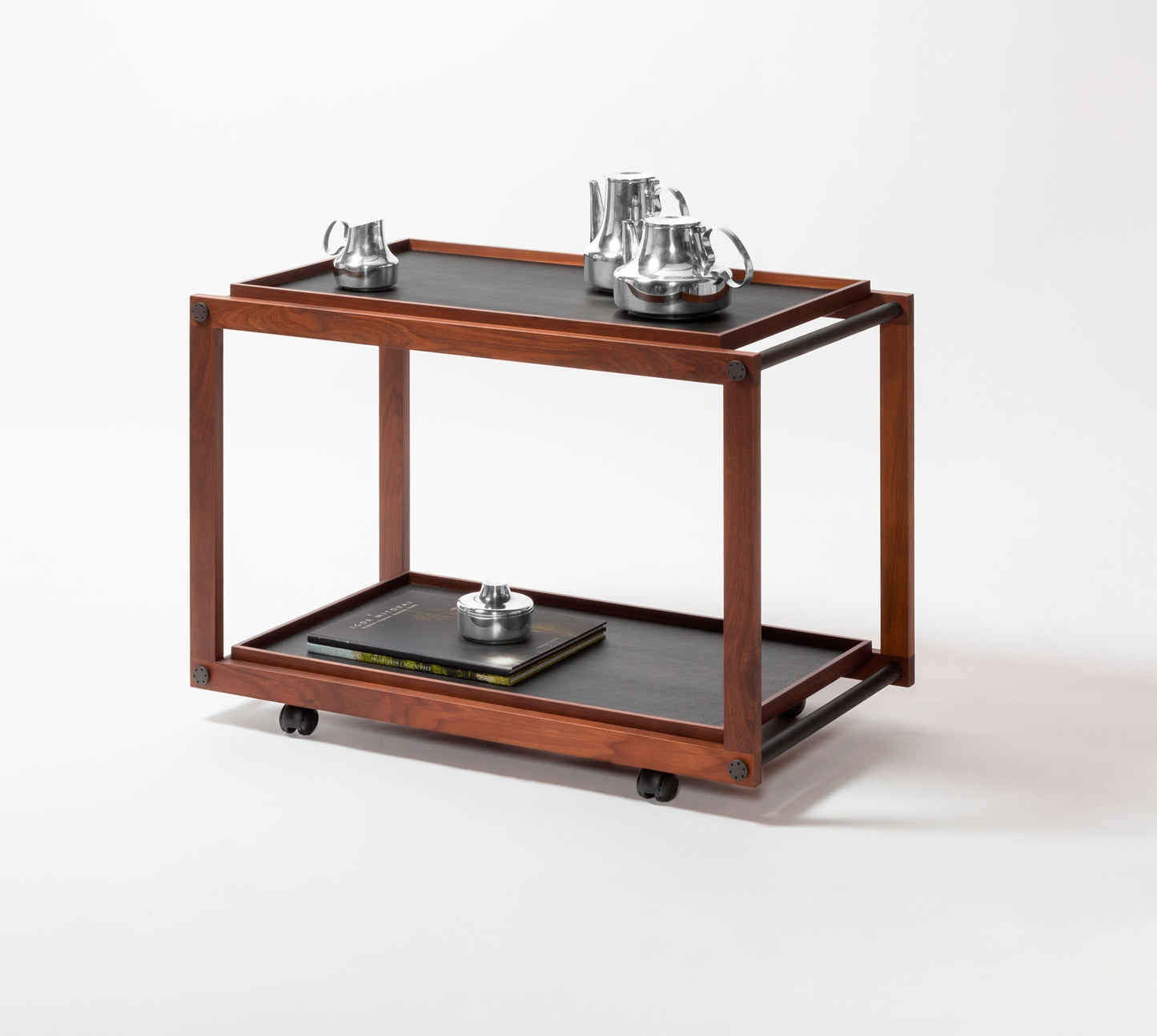 Giobagnara Jeremy Serving Trolley | Wood structure available in various finishes with fine leather and metal inserts | Includes two removable trays and omnidirectional wheels | Furniture and Serveware | 2Jour Concierge, your luxury lifestyle shop