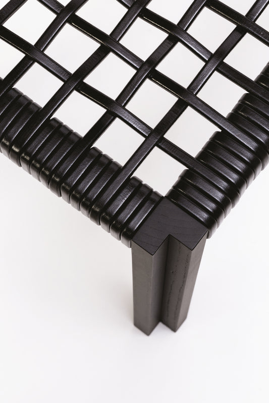 Giobagnara | Structura Crisscross Stool: Walnut wood stool with woven leather seat | Furniture / Stools | 2Jour Concierge, your luxury lifestyle shop | premium seating for expensive interiors, refined residences, and curated hospitality environments