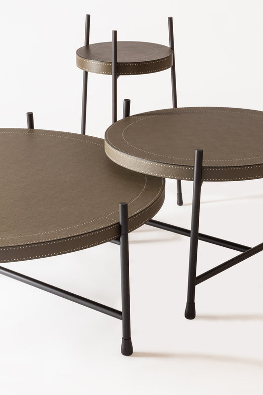 Giobagnara × Stéphane Parmentier Oblivion | Round Leather Coffee Tables: Leather tops in off-white or dark brown with bronze frame | Furniture / Coffee Tables | 2Jour Concierge, your luxury lifestyle shop | luxury interiors, hospitality décor, boutique hotels, yacht décor, executive offices, refined living