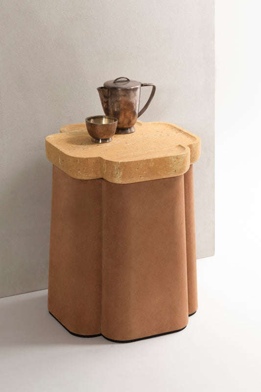 Giobagnara × Stéphane Parmentier Palladio | Side Tables: Suede leather bases with sculptural travertine tops in a selection of natural finishes, merging timeless elegance with modern sensibility | Furniture / Side Tables + Bar Tables | 2Jour Concierge, your luxury lifestyle shop | luxury interiors, hospitality décor, elegant living, boutique hotels, refined lifestyle, yacht décor, office décor, designer furniture