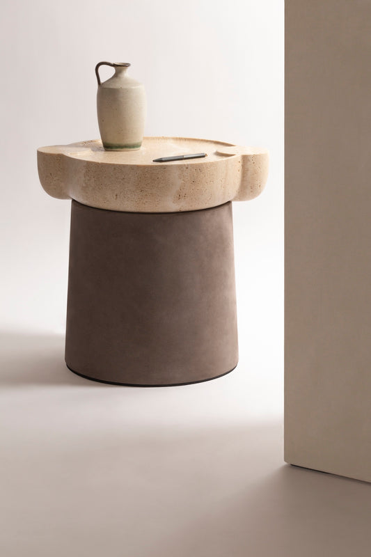 Giobagnara × Stéphane Parmentier Palladio | Side Tables: Suede leather bases with sculptural travertine tops in a selection of natural finishes, merging timeless elegance with modern sensibility | Furniture / Side Tables + Bar Tables | 2Jour Concierge, your luxury lifestyle shop | luxury interiors, hospitality décor, elegant living, boutique hotels, refined lifestyle, yacht décor, office décor, designer furniture
