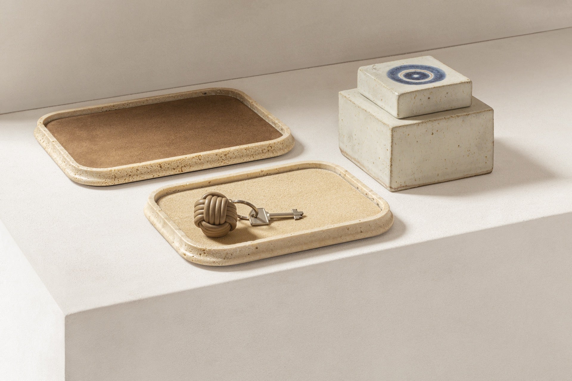 Giobagnara | Rodi Marble Valet Tray: Travertine marble with removable leather insert, available in different shapes and sizes | Decor / Valet Trays | 2Jour Concierge, your luxury lifestyle shop | natural stone, Italian craftsmanship, refined organization, timeless design