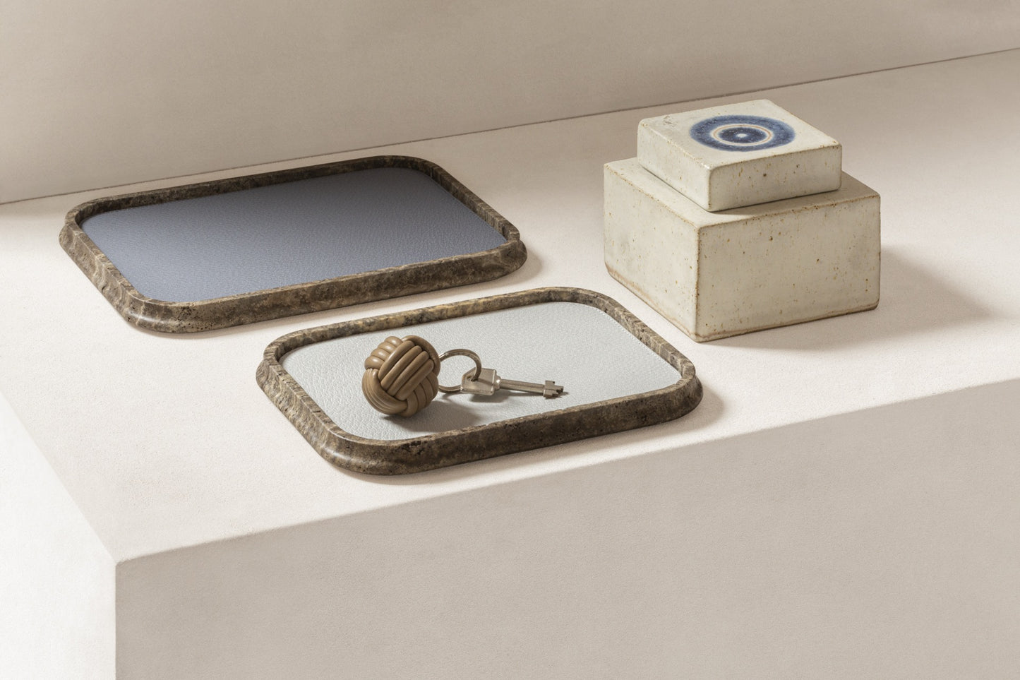 Giobagnara | Rodi Marble Valet Tray: Travertine marble with removable leather insert, available in different shapes and sizes | Decor / Valet Trays | 2Jour Concierge, your luxury lifestyle shop | natural stone, Italian craftsmanship, refined organization, timeless design
