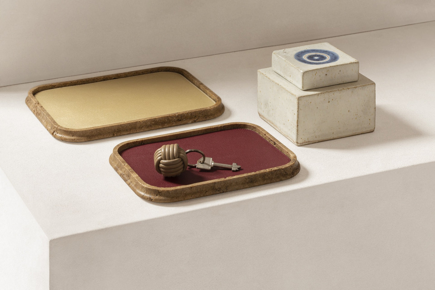 Giobagnara | Rodi Marble Valet Tray: Travertine marble with removable leather insert, available in different shapes and sizes | Decor / Valet Trays | 2Jour Concierge, your luxury lifestyle shop | natural stone, Italian craftsmanship, refined organization, timeless design