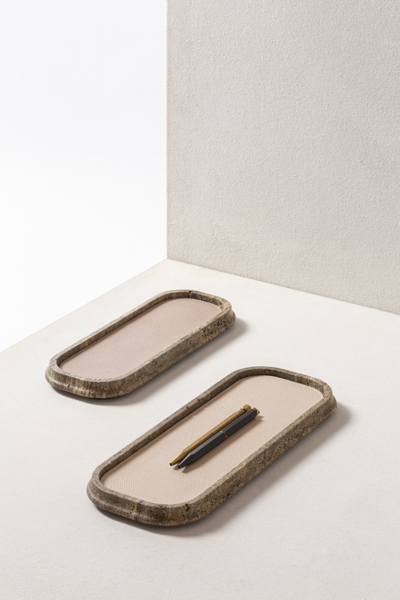 Giobagnara | Rodi Marble Valet Tray: Travertine marble with removable leather insert, available in different shapes and sizes | Decor / Valet Trays | 2Jour Concierge, your luxury lifestyle shop | natural stone, Italian craftsmanship, refined organization, timeless design