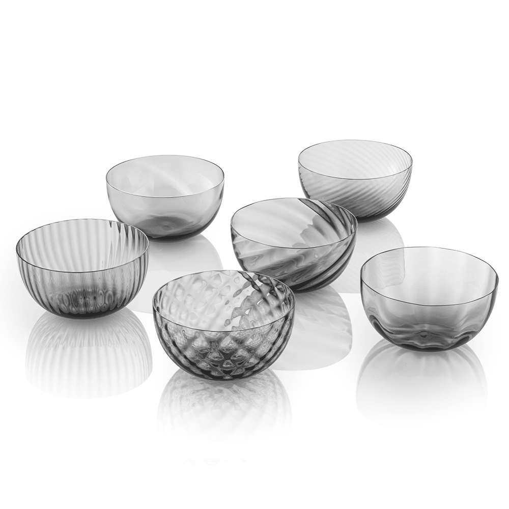 NasonMoretti Idra bowls – set of 6 | Set of six Murano glass bowls in assorted textures and colors | Each bowl features unique hand-blown craftsmanship with textures including optic, torsé, balloton, and more | A vibrant and luxurious addition to modern entertaining | Available in classic and ruby red selections | Design by NasonMoretti | Tableware & bowls | 2Jour Concierge, your luxury lifestyle shop