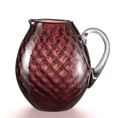 NasonMoretti Idra pitcher | Handcrafted Murano glass pitcher with iconic balloton texture | Rounded form with a crystal-clear sculpted handle for elegant pouring | Available in a vivid color palette including avio blue, grey, red, orange, soraya green, and purple | A bold yet refined statement piece for stylish entertaining | Design by NasonMoretti | Tableware & serveware | 2Jour Concierge, your luxury lifestyle shop