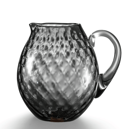 NasonMoretti Idra pitcher | Handcrafted Murano glass pitcher with iconic balloton texture | Rounded form with a crystal-clear sculpted handle for elegant pouring | Available in a vivid color palette including avio blue, grey, red, orange, soraya green, and purple | A bold yet refined statement piece for stylish entertaining | Design by NasonMoretti | Tableware & serveware | 2Jour Concierge, your luxury lifestyle shop