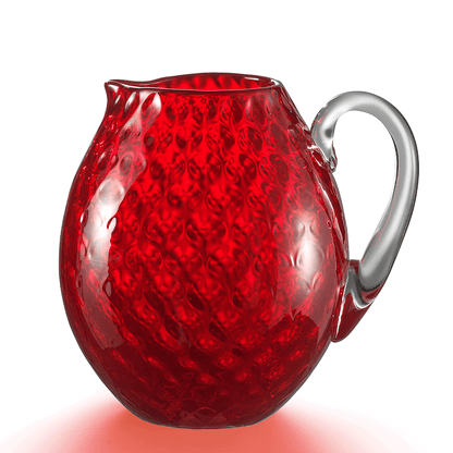 NasonMoretti Idra pitcher | Handcrafted Murano glass pitcher with iconic balloton texture | Rounded form with a crystal-clear sculpted handle for elegant pouring | Available in a vivid color palette including avio blue, grey, red, orange, soraya green, and purple | A bold yet refined statement piece for stylish entertaining | Design by NasonMoretti | Tableware & serveware | 2Jour Concierge, your luxury lifestyle shop