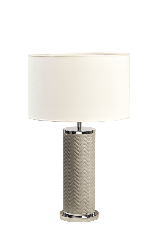 Riviere Flavia | Table Lamp: Leather-covered cylindrical base with optional braided, handwoven, or herringbone patterns, chrome or gold metal finishes, designed for refined contemporary interiors | Lighting / Table Lamps | 2Jour Concierge, your luxury lifestyle shop | luxury interiors, hospitality décor, elegant living, designer lighting, boutique hotels, refined lifestyle, yacht décor