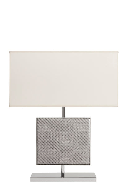 Riviere Ebe | Table Lamp: Leather-covered body in handwoven, diamond, or herringbone quilted patterns, chrome or gold metal base, designed for living or hospitality interiors | Lighting / Table Lamps | 2Jour Concierge, your luxury lifestyle shop | luxury interiors, hospitality décor, elegant living, designer lighting, boutique hotels, refined lifestyle, yacht décor